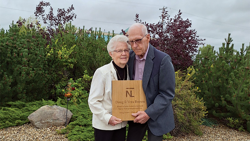 Doug and Vera holding their tile