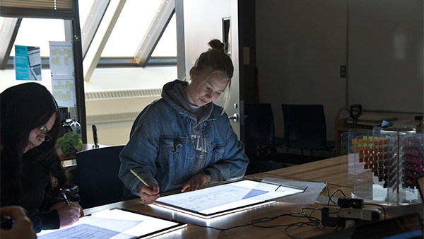Interior Design students working on drafts