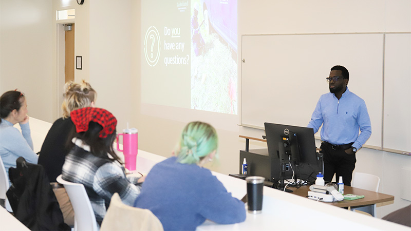 Tajudeen Iman presenting