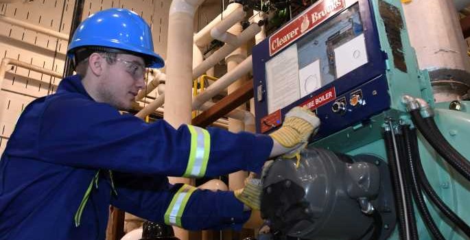 student in power engineering lab