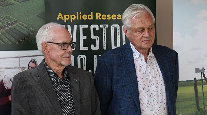 Ken Knowles and Jerry Bouma stand side by side.