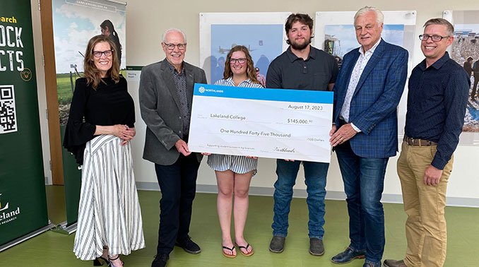 Northlands representatives present cheque to Lakeland College