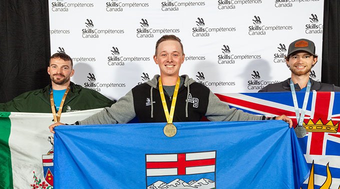 silver medalist works on project during Alberta Skills
