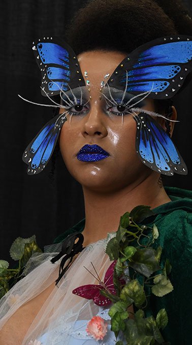 A model wears butterfly-inspired makeup.