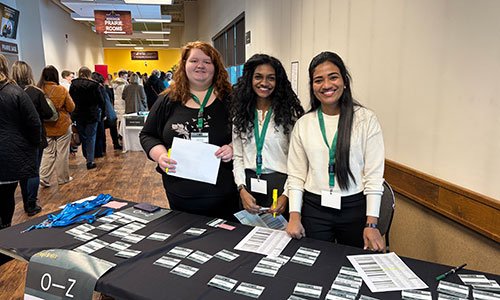 Students helping at Inspiring Women Conference