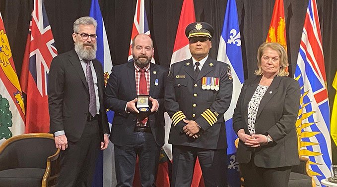 Shawn McKerry and Wayne Rose receive the award in Ottawa, Ont. 