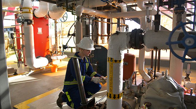Kateryna Svidrak in her process and power engineering gear.