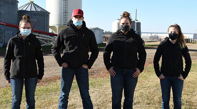Members of the Student-Managed Farm - Powered by New Holland crop unit.