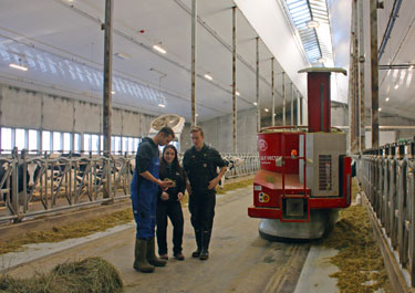 members of the dairy SMF unit monitor the DeLaval Automated Milking System (robotic parlour)