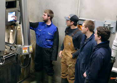 members of the dairy SMF unit monitor the DeLaval Automated Milking System (robotic parlour)