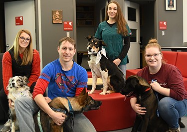 student group with dogs