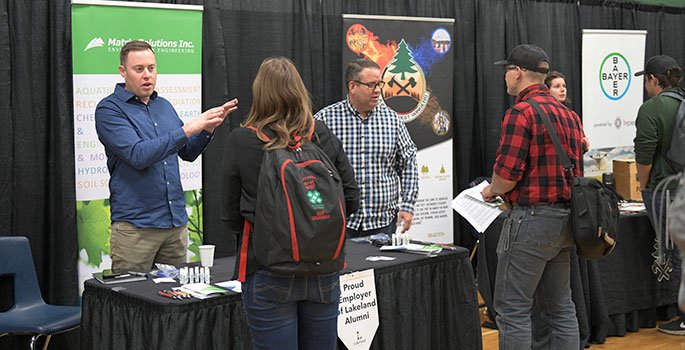 Student at a vendor during the Ag and Enviro career fair