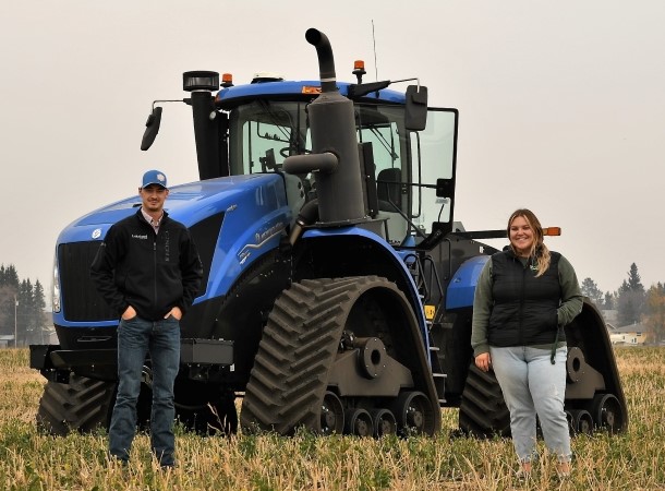 Lakeland students standing in front of tractor