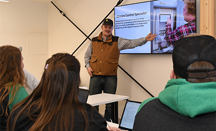Agribusiness student presenting to his class