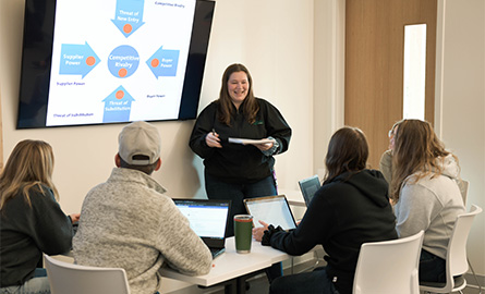 Student presenting to fellow agribusiness students