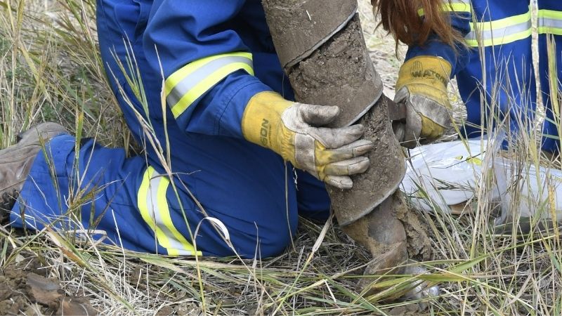 BASEM student collecting soil samples