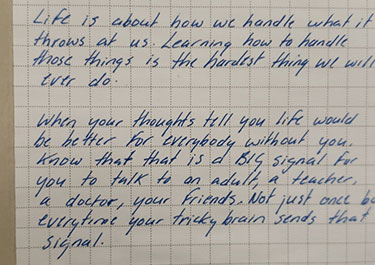 A handwritten note to Indigenous youth