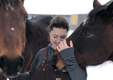 j'Amey Bevan with horses