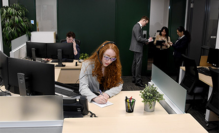 Woman sitting at desk in office