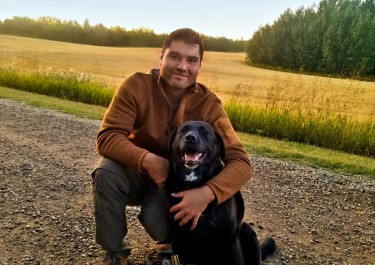 Danny Bruno with his dog, Captain, a rescue.
