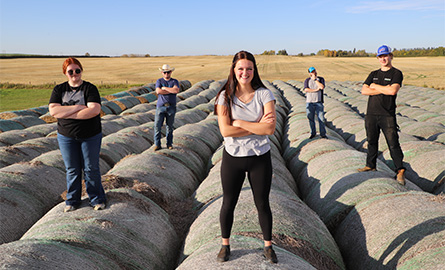 Lakeland students on top of haybales