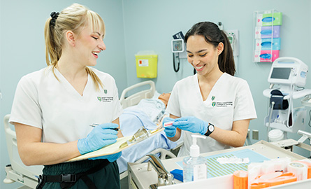 Nurses standing in scrubs