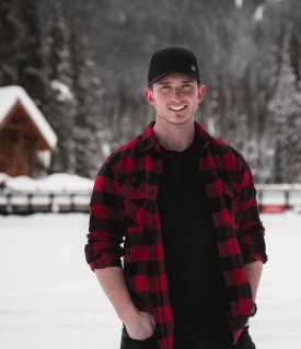 Matthew Gerolami outside in winter in mountains