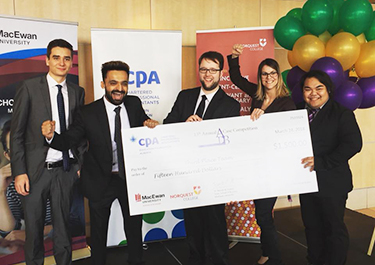 Sarpal celebrating with colleagues