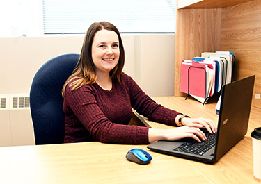 heather healy at her desk