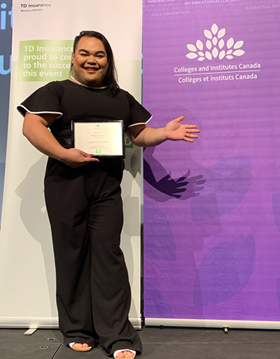 William Yap holds his CICAN certificate