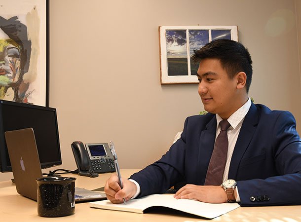 Lakeland students shaking hands during a presentation