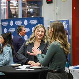 Students networking at career fair