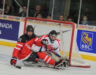 Chris Cederstrand in front of hockey net on the ice