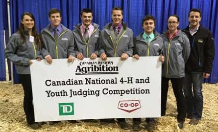 judging team with banner at Agribition