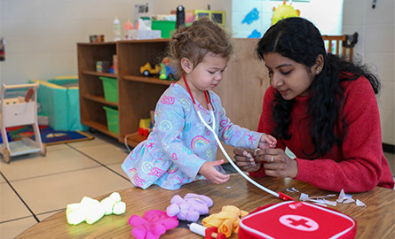Lakeland student playing games with students in a classroom