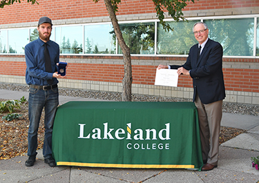 Tanner Shaw receives Governor General Award from Lakeland college 