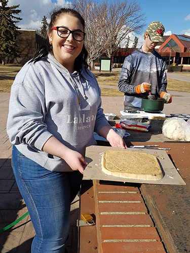 The student members cook up a tasty treat for local birds. The suet was made for the campus bird feeders with a nutritional recipe. 