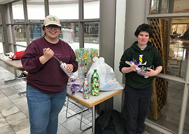 The club put the finishing touches on their bees wax wraps just in time for the holiday season. (Middle) Enviro Club members encouraged students, staff and community members to build ecobricks out of single-use plastics