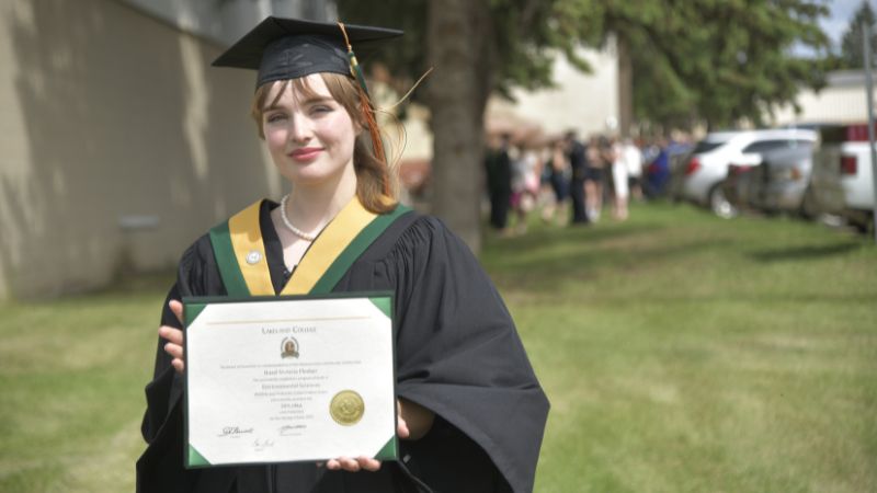 Hazel Flesher with her Lakeland College diploma