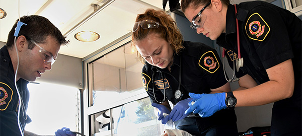 First responders working on injured person