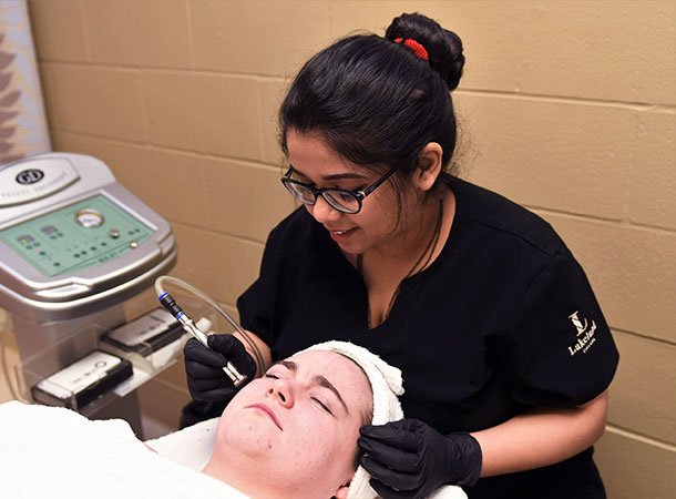 Student practicing skills on a model