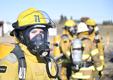 Ashlea Suderman in her firefighting gear.