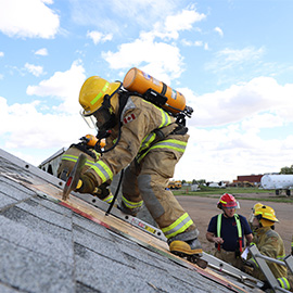 Student practicing roof access