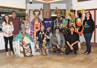 he Indigenous Student Committee with the powwow dancers