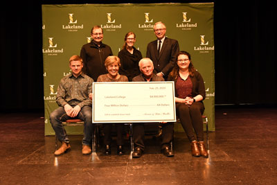 Rita and Armin Mueller (centre) of Canadian Rangeland Bison and Elk, present Lakeland with a $4 million donation to purchase land and establish a bison herd at the college. Joining them for the presentation are (back row from left) Ed Stelmach, honorary chair of Lakeland's Leading. Learning. The Lakeland Campaign, Dr. Alice Wainwright Stewart, Scott Webb, board chair, and (front row) students Ben Rajotte and Emmalee Williamson.