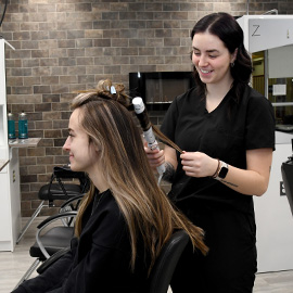 Student hairstylist in the salon