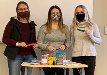 Lana Rogan and her group presenting their project to the panel