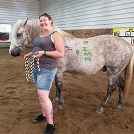 Kelsie McCabe with a horse
