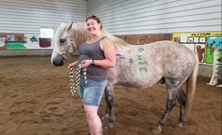 Kelsie McCabe with a horse