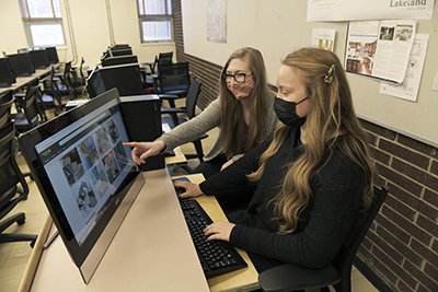 Interior design students Brea Holt and Carolyn Stensrud navigate Materialbank